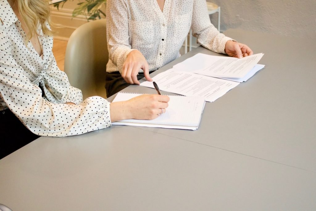 Professional reviewing tax documents at a desk